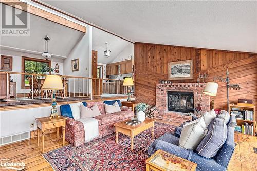 795310 The Blue Mtns - Clearview, Blue Mountains, ON - Indoor Photo Showing Living Room With Fireplace