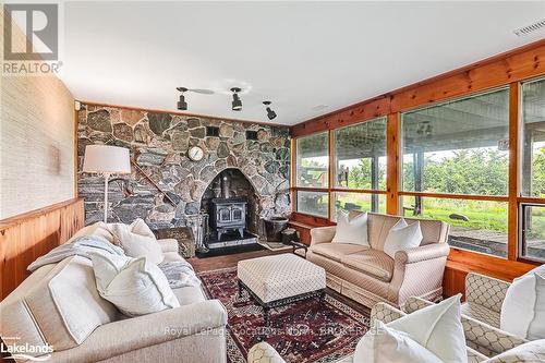 795310 The Blue Mtns - Clearview, Blue Mountains, ON - Indoor Photo Showing Living Room With Fireplace