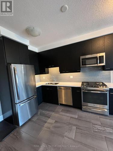 904 - 63 Arthur Street S, Guelph, ON - Indoor Photo Showing Kitchen With Double Sink