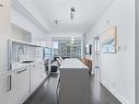 Living room - 2707-1050 Rue Drummond, Montréal (Ville-Marie), QC  - Indoor Photo Showing Kitchen With Upgraded Kitchen 