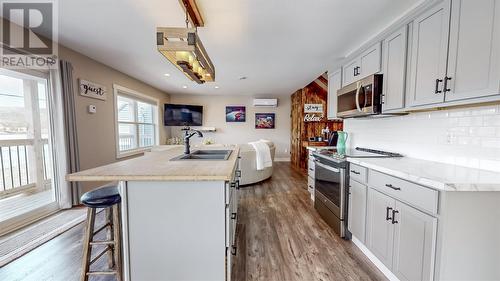 94 Southside Road, Petty Harbour, NL - Indoor Photo Showing Kitchen With Double Sink