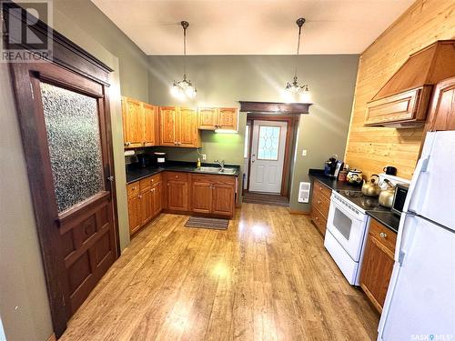 104 Pine Street, Chitek Lake, SK - Indoor Photo Showing Kitchen With Double Sink