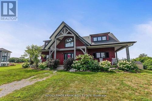 20851 Loyalist Parkway, Prince Edward County (Ameliasburgh), ON - Outdoor With Deck Patio Veranda With Facade