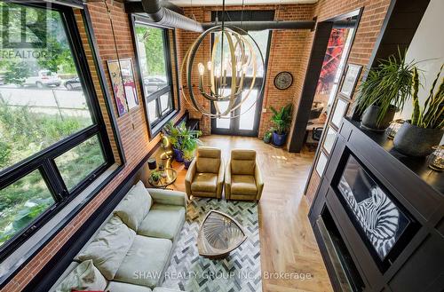 101 - 85 Spruce Street, Waterloo, ON - Indoor Photo Showing Other Room With Fireplace