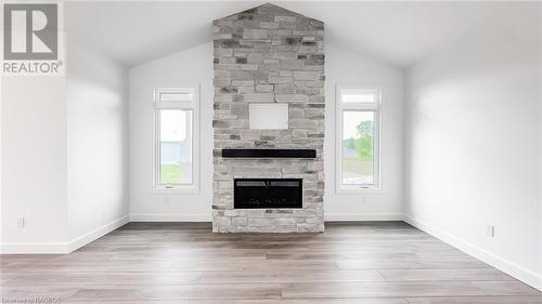 10 Mctavish Crescent, Ripley, ON - Indoor Photo Showing Living Room With Fireplace