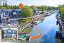 Superb riverfront condo close to beach w/ dock - 4 - 5 River Road, Lambton Shores (Grand Bend), ON  - Outdoor With Body Of Water With View 