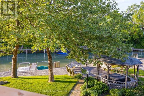 Showing the river view directly from the deck. - 4 - 5 River Road, Lambton Shores (Grand Bend), ON - Outdoor With Body Of Water