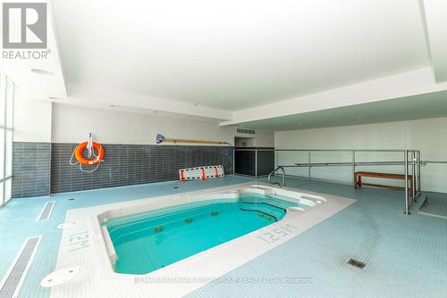 711 - 1600 Charles Street, Whitby (Port Whitby), ON - Indoor Photo Showing Other Room With In Ground Pool