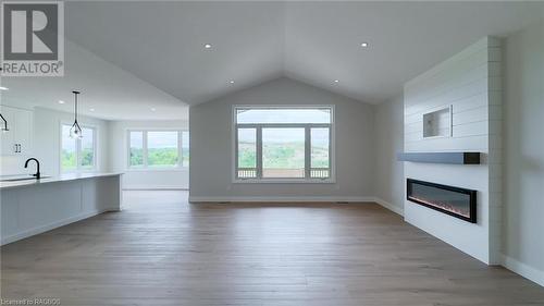 48 Mctavish Crescent, Ripley, ON - Indoor With Fireplace