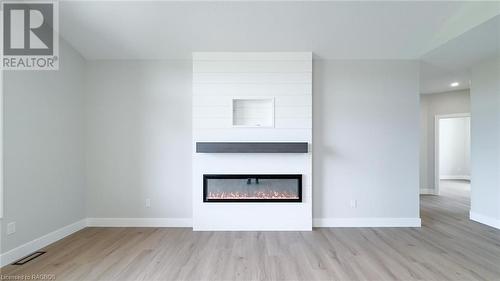 48 Mctavish Crescent, Ripley, ON - Indoor Photo Showing Living Room With Fireplace