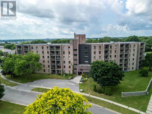 614 - 17 Eldon Hall Place, Kingston, ON - Outdoor With Balcony With Facade