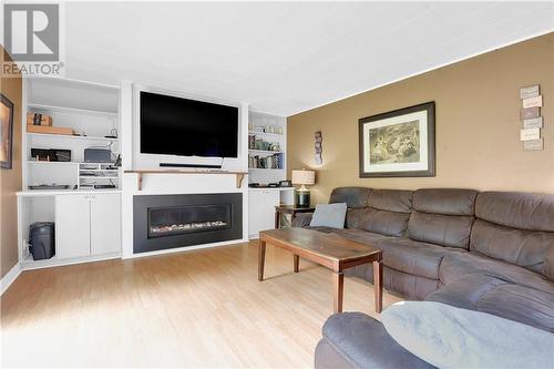 FAMILY ROOM WITH GAS FIREPLACE - 1017 Osborne Avenue, Cornwall, ON - Indoor Photo Showing Living Room With Fireplace