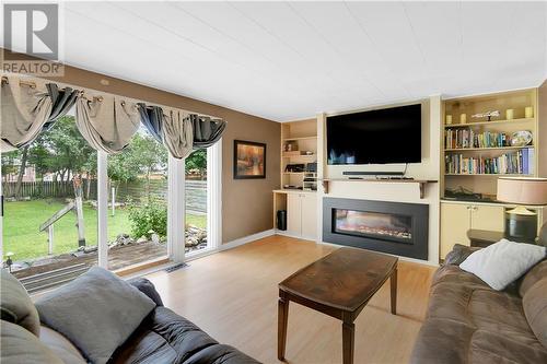 FAMILY ROOM WITH A VIEW - 1017 Osborne Avenue, Cornwall, ON - Indoor Photo Showing Living Room With Fireplace