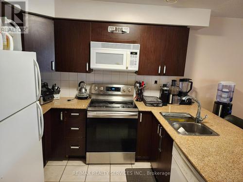 212 - 7405 Goreway Drive W, Mississauga (Malton), ON - Indoor Photo Showing Kitchen With Double Sink