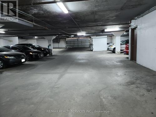 212 - 7405 Goreway Drive W, Mississauga (Malton), ON - Indoor Photo Showing Garage