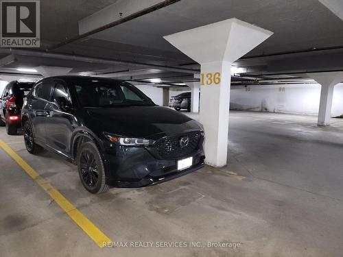 212 - 7405 Goreway Drive W, Mississauga (Malton), ON - Indoor Photo Showing Garage