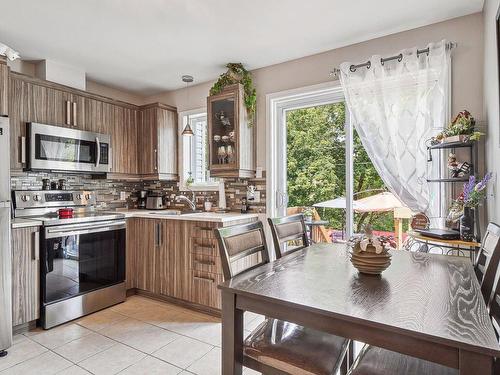 Dining room - 36  - 38 Rue Des Grands-Ducs, Lavaltrie, QC - Indoor Photo Showing Kitchen