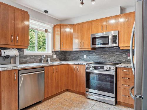 Kitchen - 36  - 38 Rue Des Grands-Ducs, Lavaltrie, QC - Indoor Photo Showing Kitchen