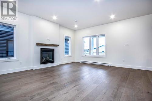 18 Reddley Place, Conception Bay South, NL - Indoor Photo Showing Living Room With Fireplace