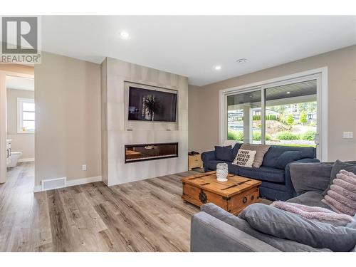 245 Summer Wood Drive, Kelowna, BC - Indoor Photo Showing Living Room With Fireplace