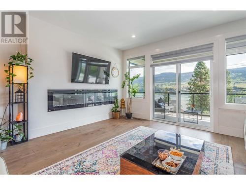 11596 Pretty Road, Lake Country, BC - Indoor Photo Showing Living Room With Fireplace