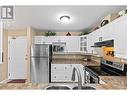 3283 Casorso Road Unit# 108, Kelowna, BC  - Indoor Photo Showing Kitchen With Double Sink 