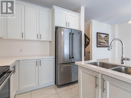 18 Heming Trail, Hamilton (Ancaster), ON - Indoor Photo Showing Kitchen With Double Sink