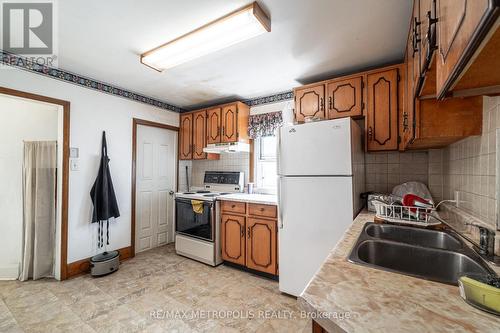 97 N Woodrow Boulevard, Toronto (Clairlea-Birchmount), ON - Indoor Photo Showing Kitchen With Double Sink