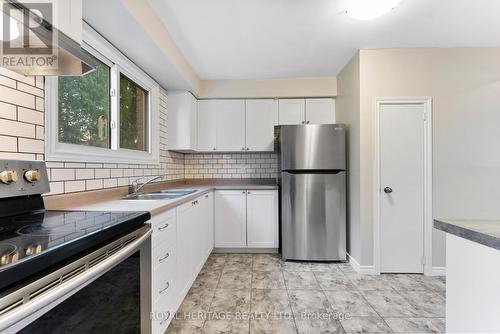 55 - 1095 Mississaga Street W, Orillia, ON - Indoor Photo Showing Kitchen With Double Sink