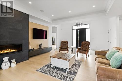 178 Bouchard, Dieppe, NB - Indoor Photo Showing Living Room With Fireplace