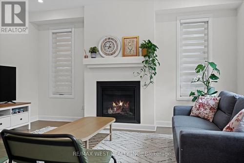 129 Shallow Pond Place, Ottawa (Cumberland), ON - Indoor Photo Showing Living Room With Fireplace