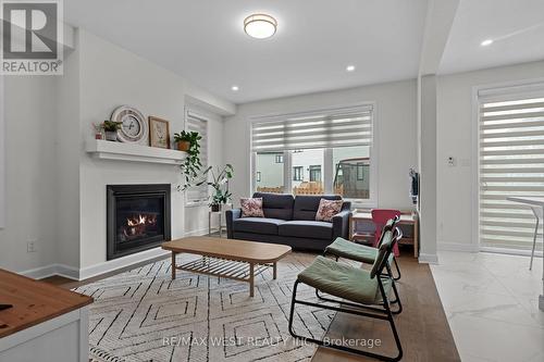 129 Shallow Pond Place, Ottawa (Cumberland), ON - Indoor Photo Showing Living Room With Fireplace