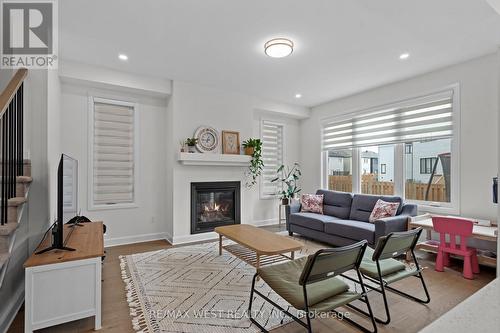 129 Shallow Pond Place, Ottawa (Cumberland), ON - Indoor Photo Showing Living Room With Fireplace