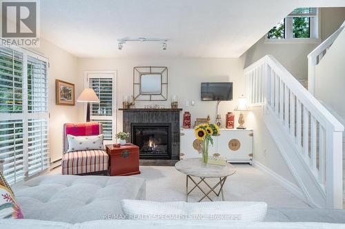 3 - 493 Oxbow Crescent, Collingwood, ON - Indoor Photo Showing Living Room With Fireplace