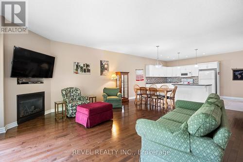 4 - 6753 O'Neil Street, Niagara Falls, ON - Indoor Photo Showing Living Room With Fireplace