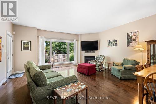 4 - 6753 O'Neil Street, Niagara Falls, ON - Indoor Photo Showing Living Room With Fireplace