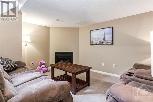 806 Tabaret Street, Ottawa, ON - Indoor Photo Showing Living Room With Fireplace