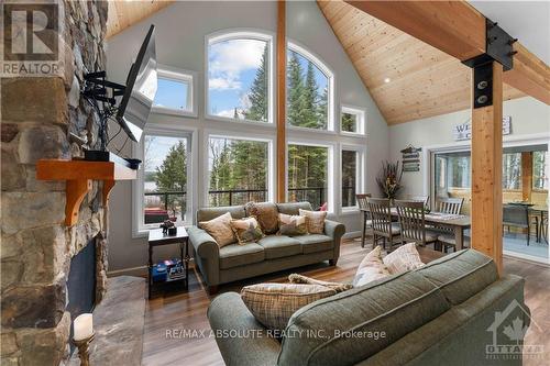 4634 Matawatchan Road, Greater Madawaska, ON - Indoor Photo Showing Living Room With Fireplace