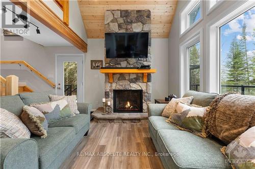 4634 Matawatchan Road, Greater Madawaska, ON - Indoor Photo Showing Living Room With Fireplace