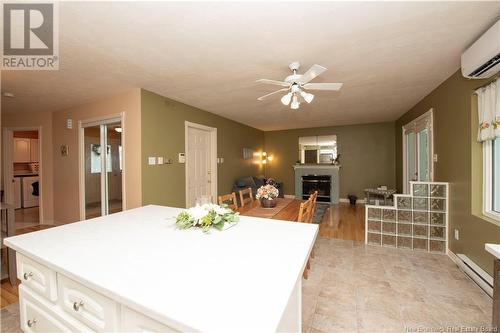 213 Shannon Drive, Moncton, NB - Indoor Photo Showing Dining Room With Fireplace