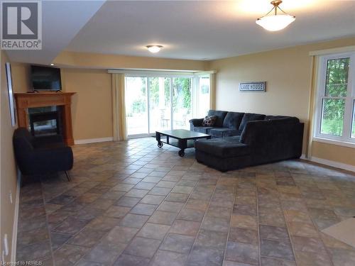 3477 Trout Lake Road Unit# 6, North Bay, ON - Indoor Photo Showing Living Room With Fireplace