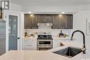 203 Adaskin Cove, Saskatoon, SK  - Indoor Photo Showing Kitchen With Upgraded Kitchen 