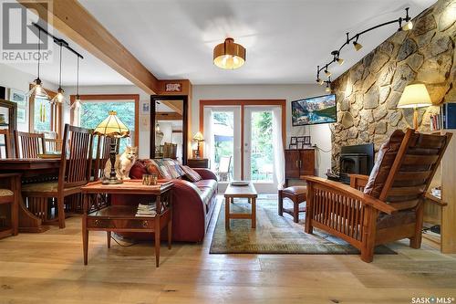 110 Sunset Drive, Regina, SK - Indoor Photo Showing Living Room With Fireplace