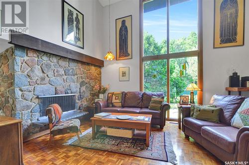 110 Sunset Drive, Regina, SK - Indoor Photo Showing Living Room With Fireplace