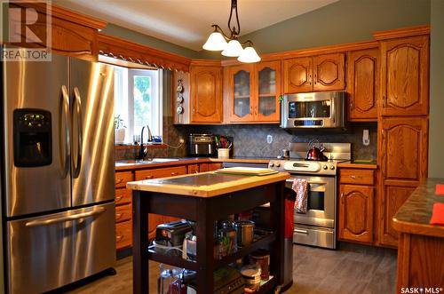 103 Bentham Crescent, Saskatoon, SK - Indoor Photo Showing Kitchen With Stainless Steel Kitchen