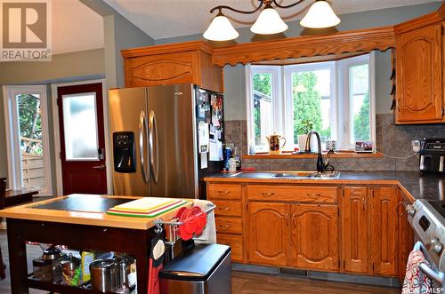 103 Bentham Crescent, Saskatoon, SK - Indoor Photo Showing Kitchen With Double Sink