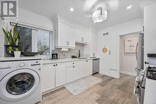 239 Burnhamthorpe Road, Toronto (Islington-City Centre West), ON - Indoor Photo Showing Laundry Room