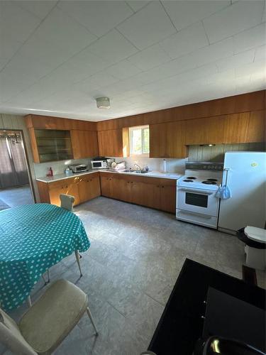 208 First Street E, Sandy Lake, MB - Indoor Photo Showing Kitchen With Double Sink