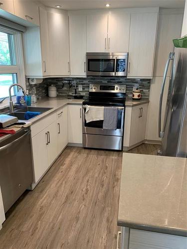 1739 Lorne Avenue, Brandon, MB - Indoor Photo Showing Kitchen