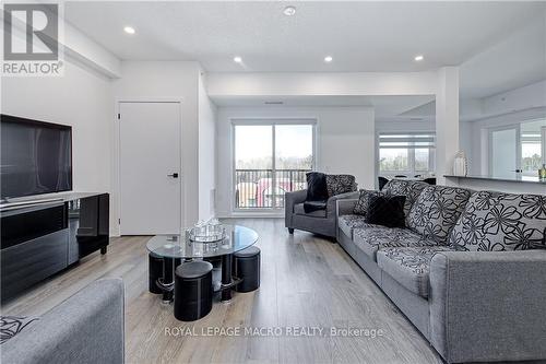 201 - 8 Culinary Lane, Barrie, ON - Indoor Photo Showing Living Room